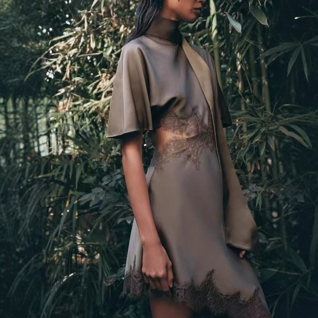 Silk satin dress with lace cutout design at the waist