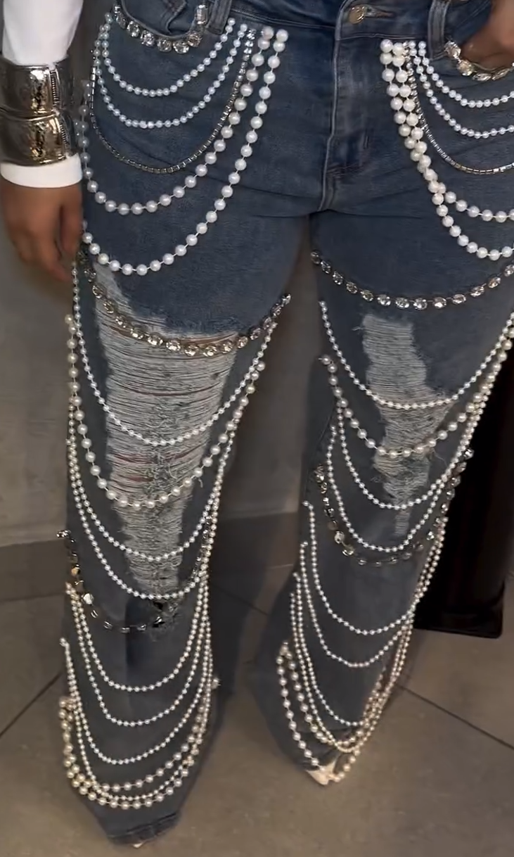 Jeans with pearl and rhinestone embellishments