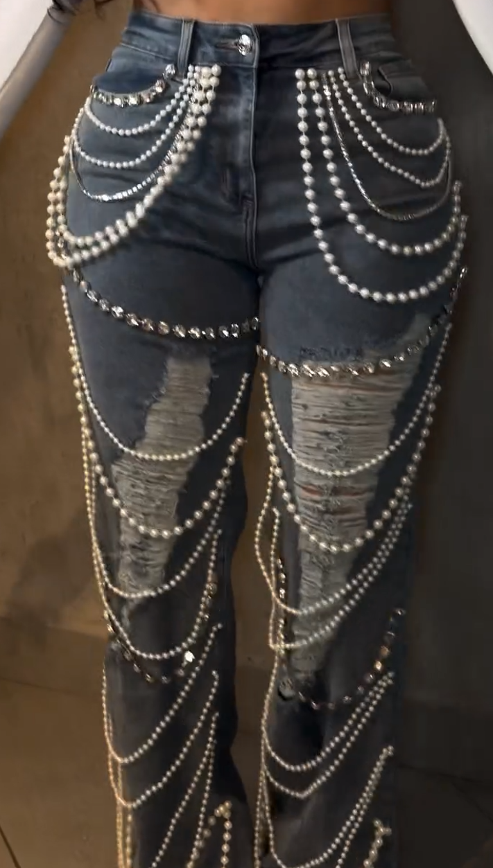 Jeans with pearl and rhinestone embellishments