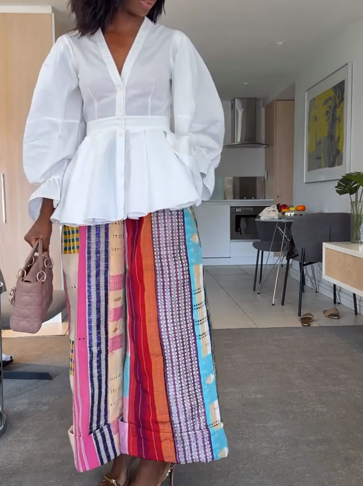 White ruffled top + colorful stitching wide-leg pants
