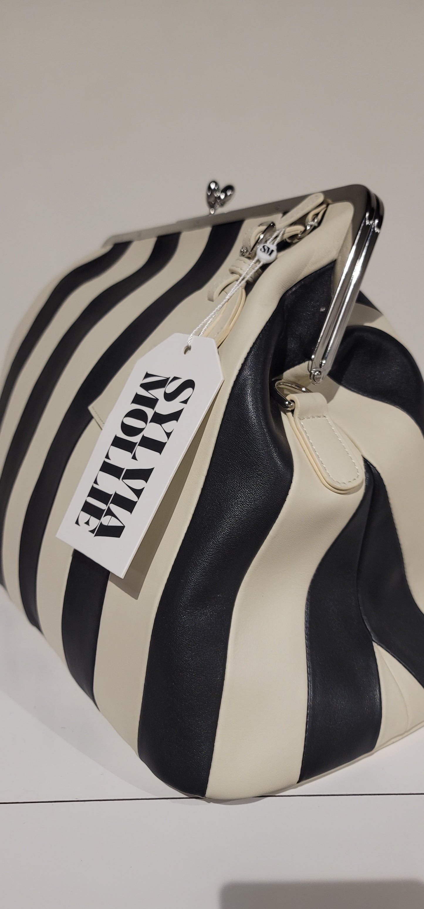Embossed premium leather stripe kiss lock bag