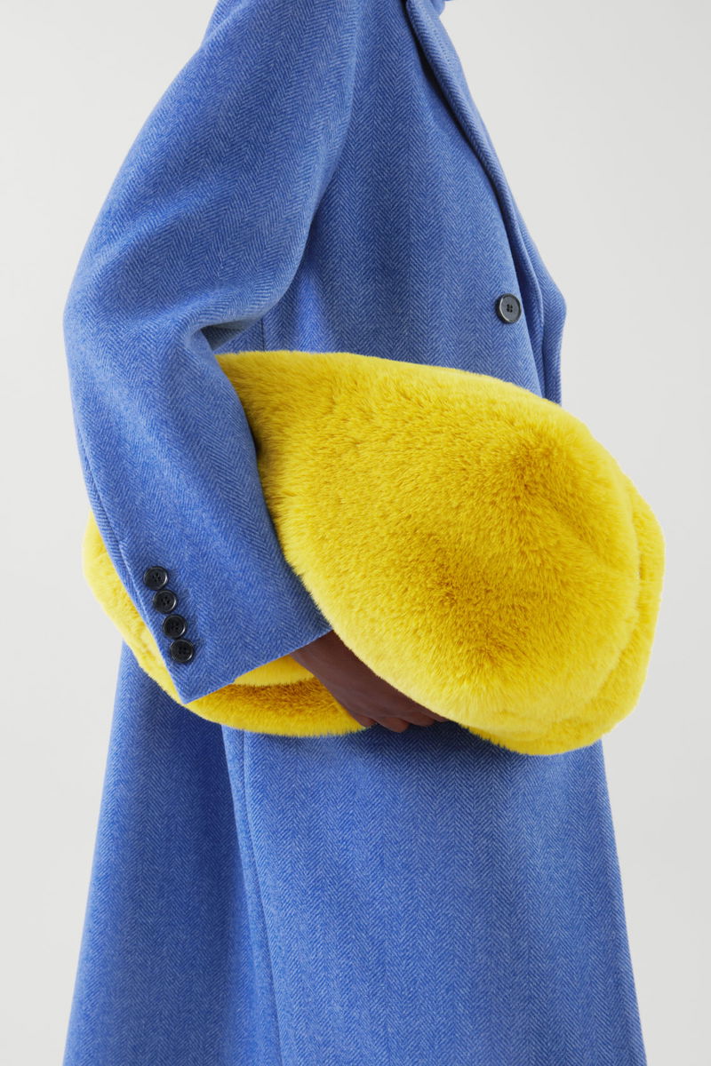 Oversized faux fur clutch