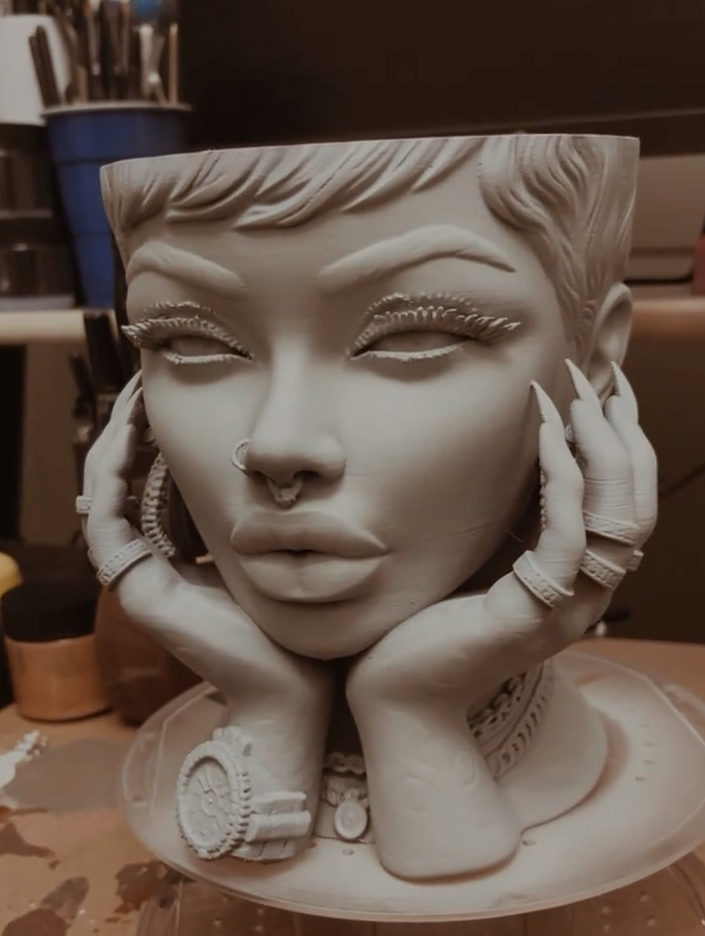 Sculptural illustrated planter
