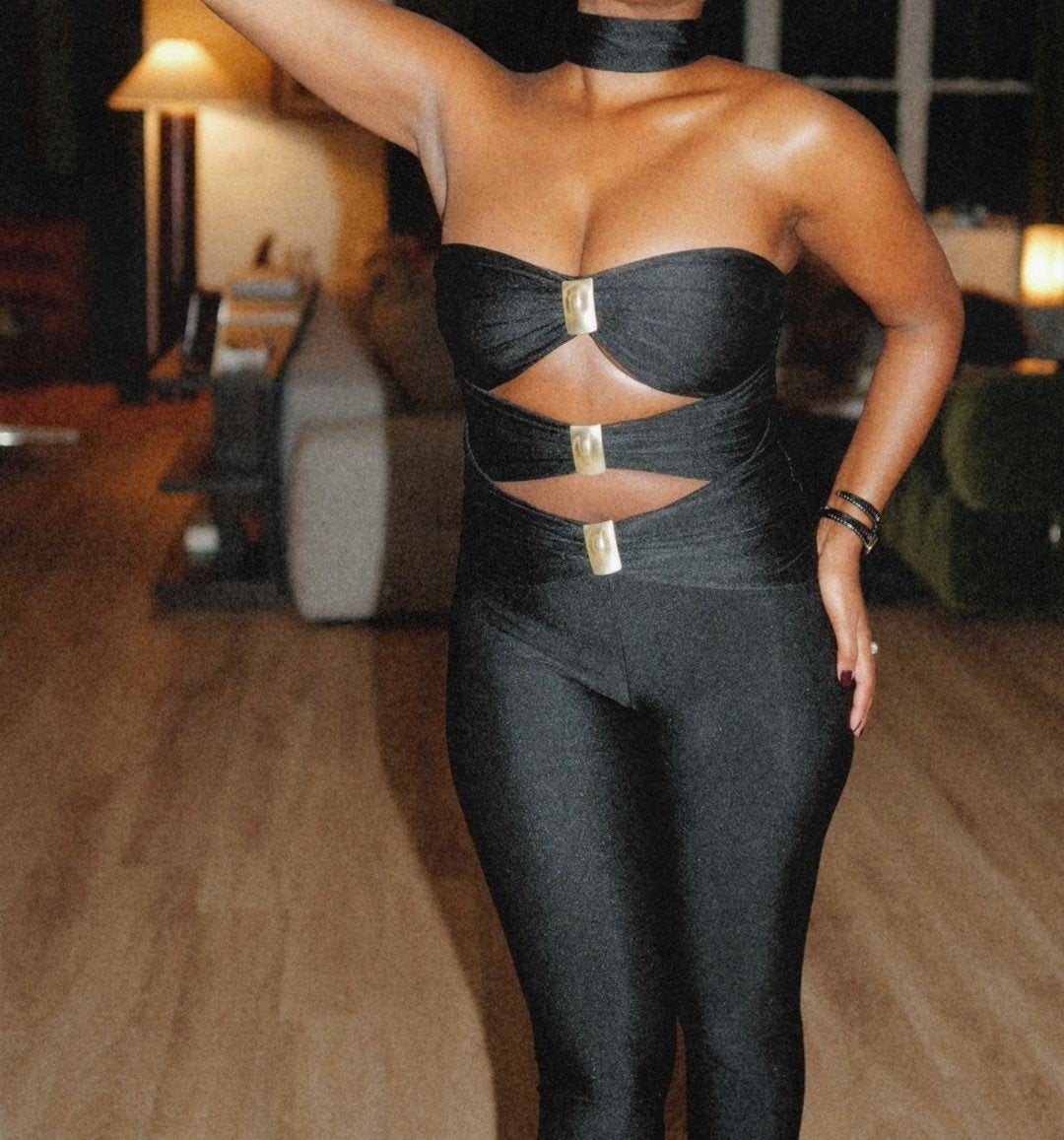 Hollow black sleeveless halterneck jumpsuit