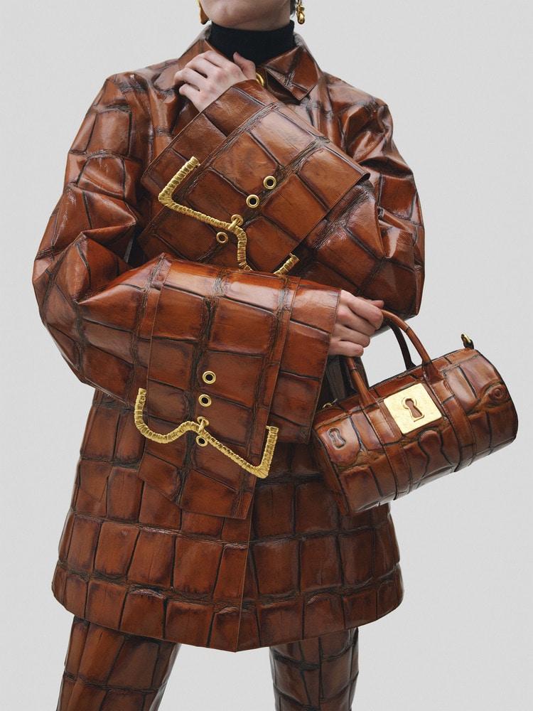 Crocodile-print amber leather coat