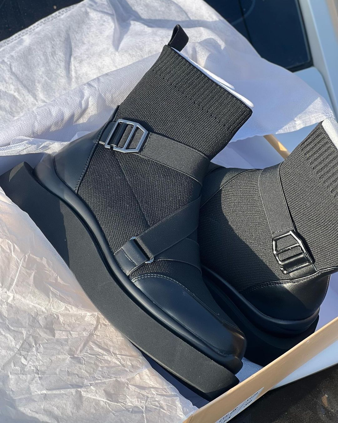 Lace and buckle leather boots