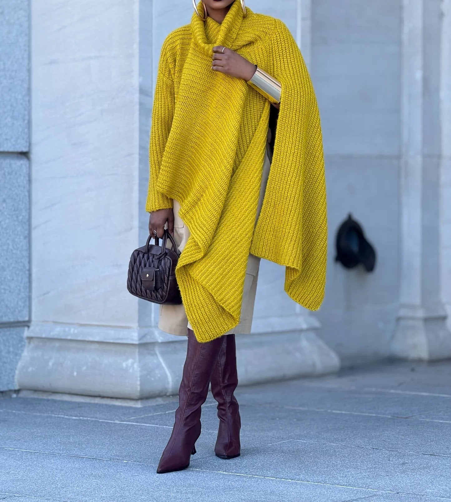 Yellow turtleneck knitted cape