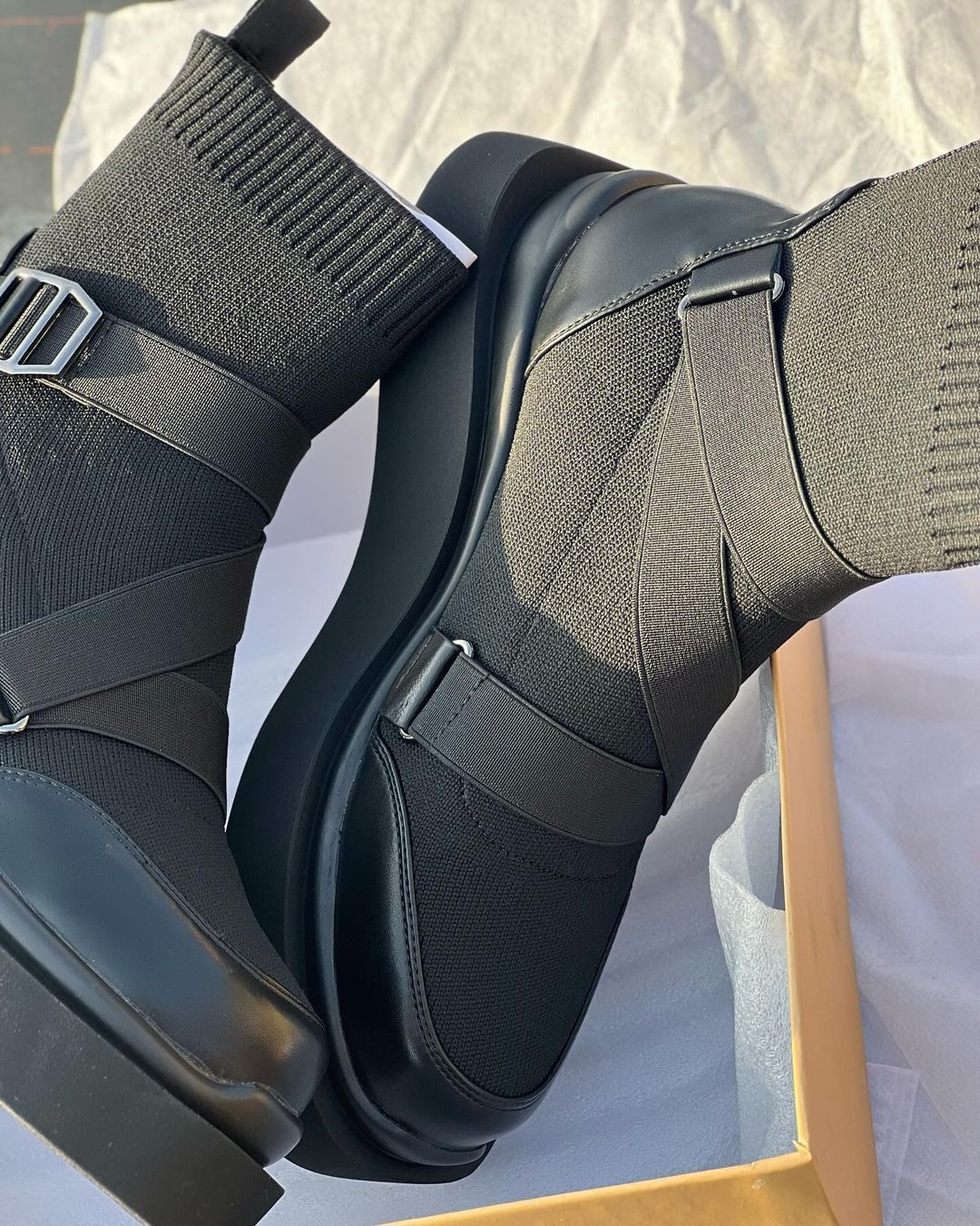 Lace and buckle leather boots