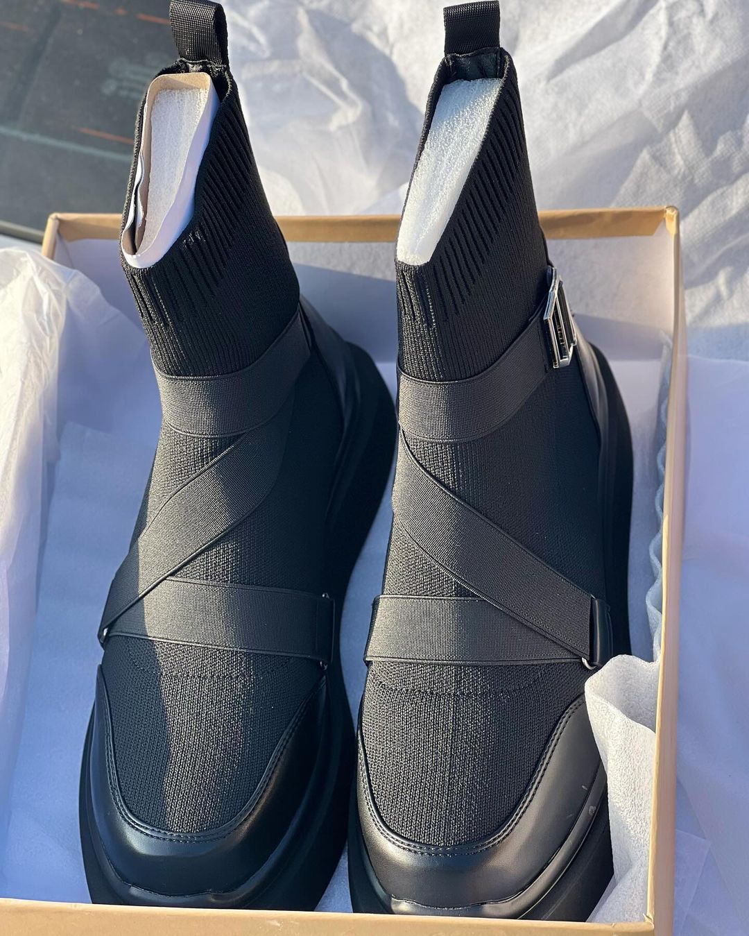 Lace and buckle leather boots
