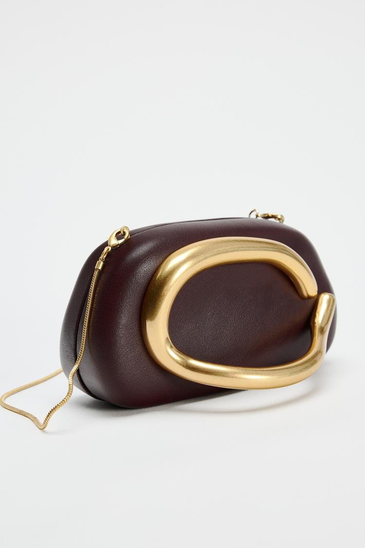 Metal embellished clutch