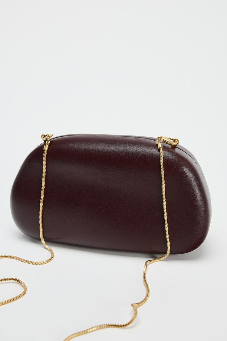 Metal embellished clutch