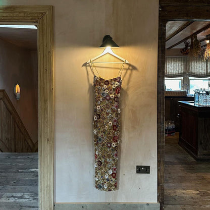 Heavily beaded suspender dress