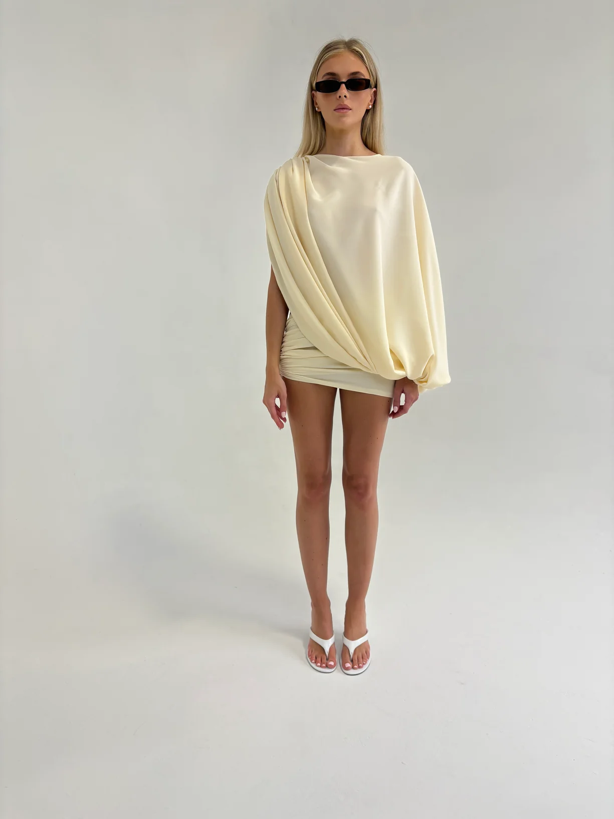 Irregularly draped puff sleeve top