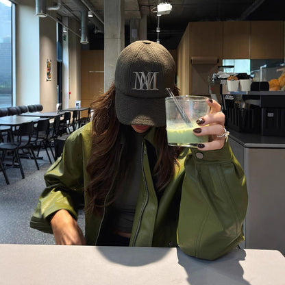 Loose-fitting green jacket with lapel