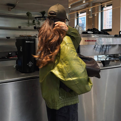 Loose-fitting green jacket with lapel