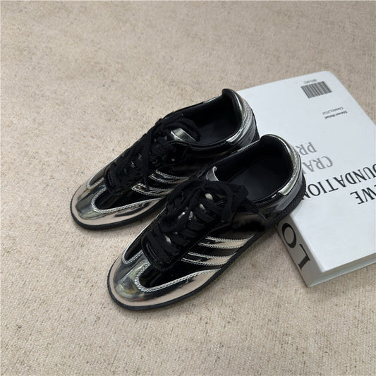Black and silver color-blocked German training shoes