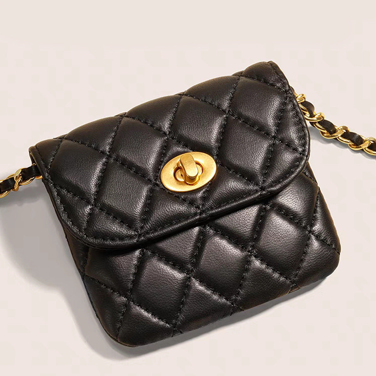 Women's lambskin gold ball waist bag and chain