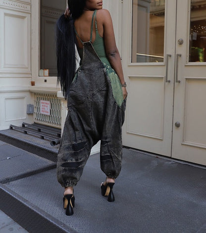 Distressed denim overalls
