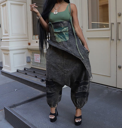 Distressed denim overalls