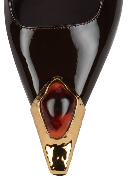 Slingback pump with metal toe-cap and jeweled ornament