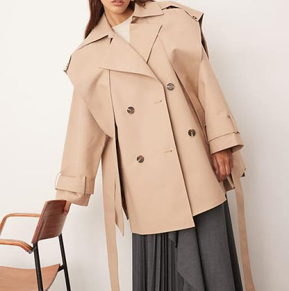 Double-breasted short trench coat with cape details