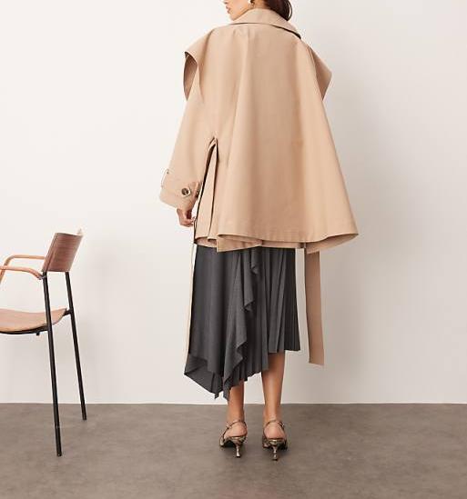 Double-breasted short trench coat with cape details