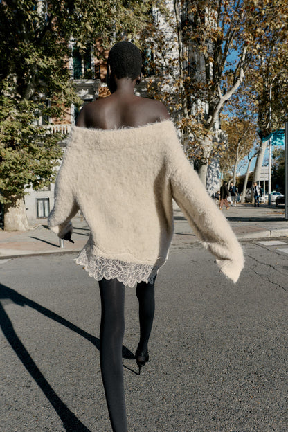 Asymmetrical lace sweater