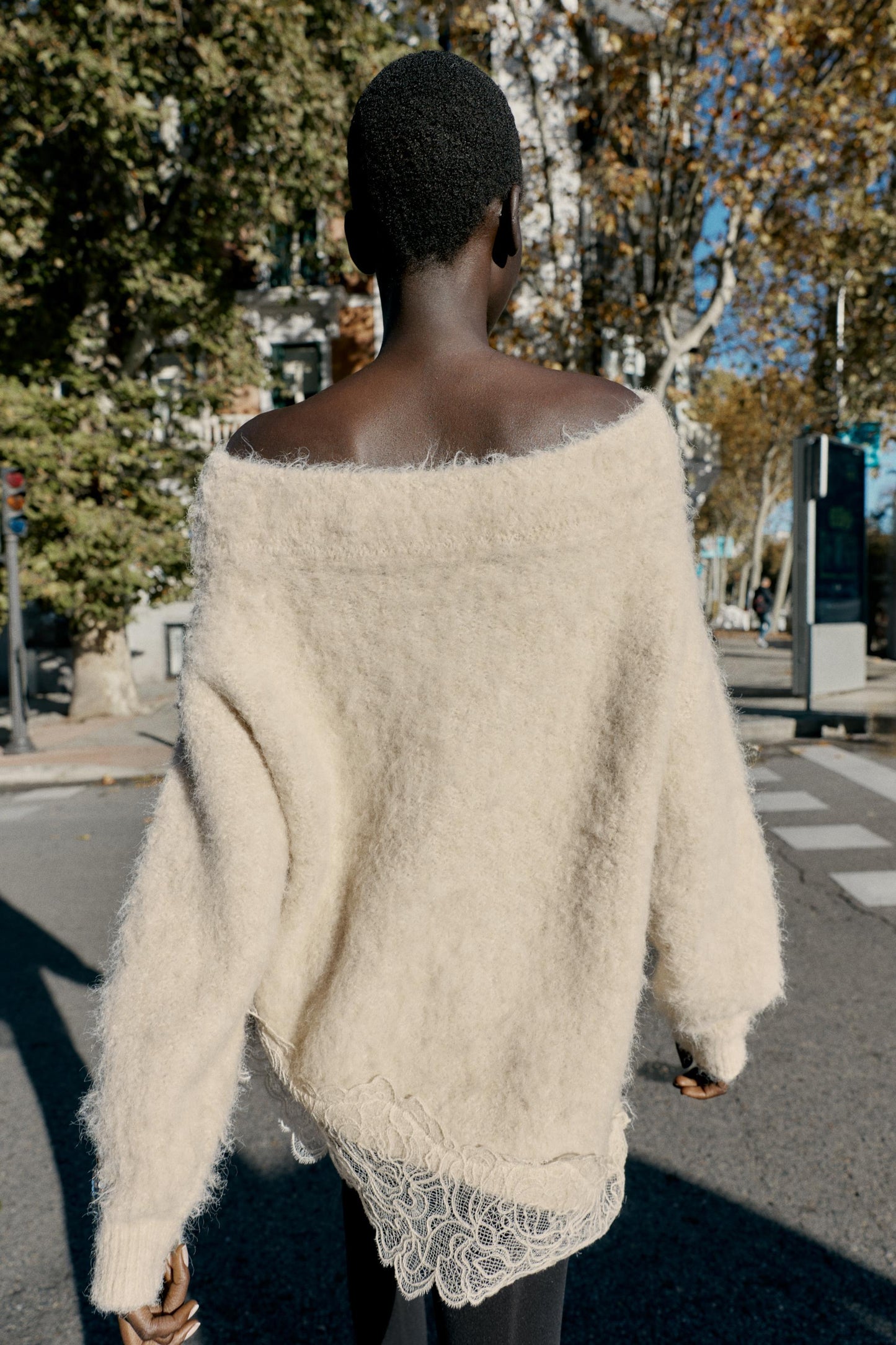 Asymmetrical lace sweater