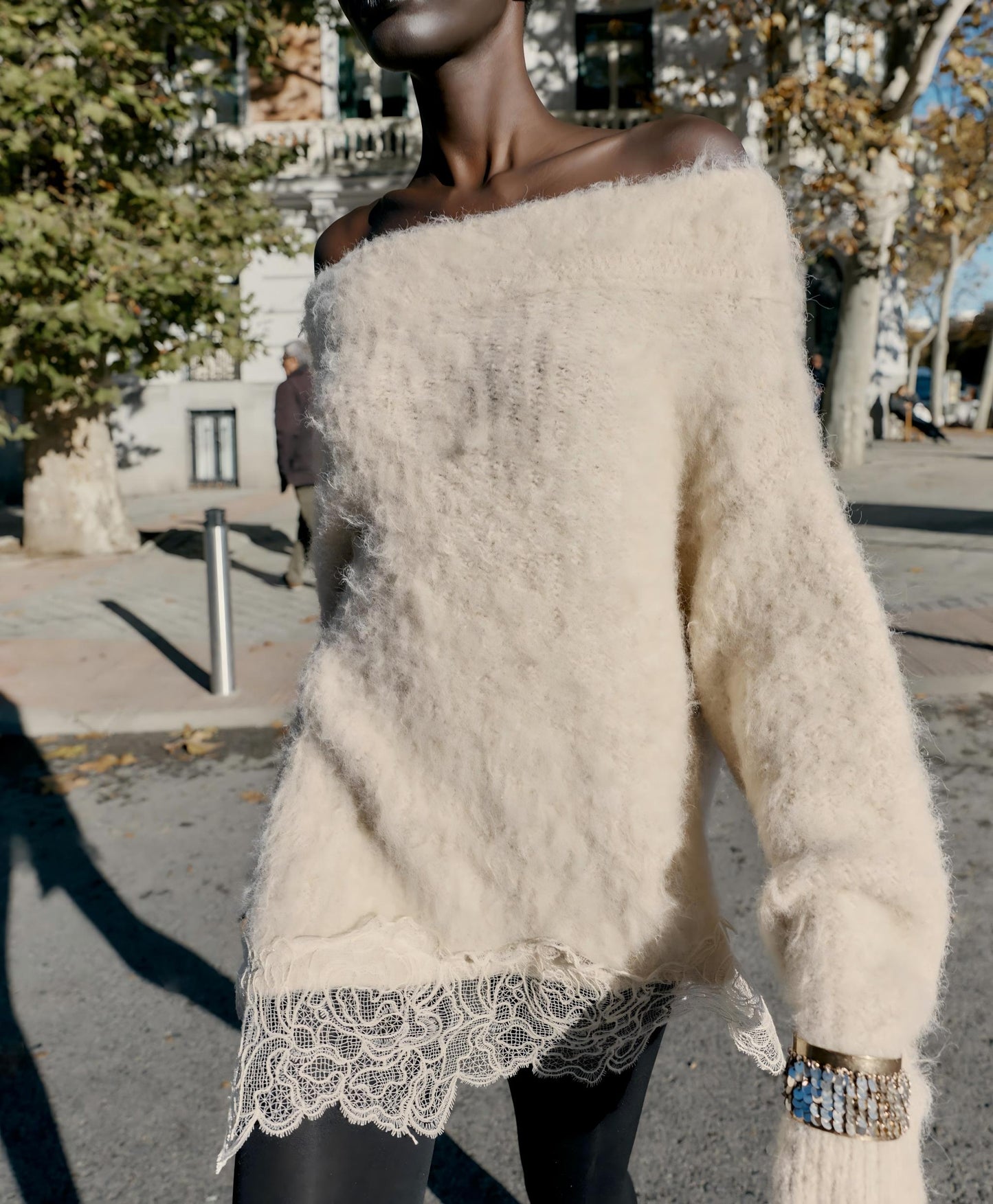 Asymmetrical lace sweater