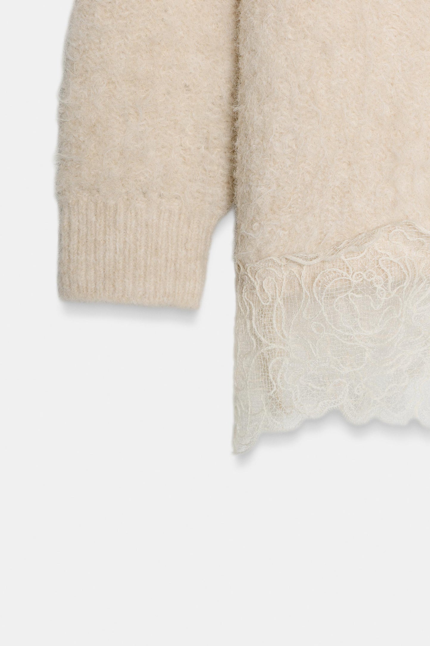 Asymmetrical lace sweater