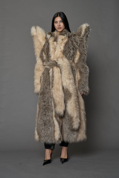 Exaggerated faux fur coat with exaggerated shoulders