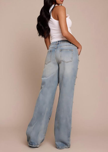 Blue high-waisted jeans with rounded studs