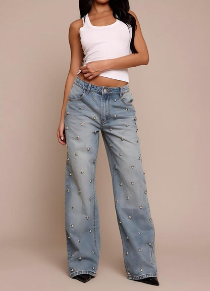 Blue high-waisted jeans with rounded studs