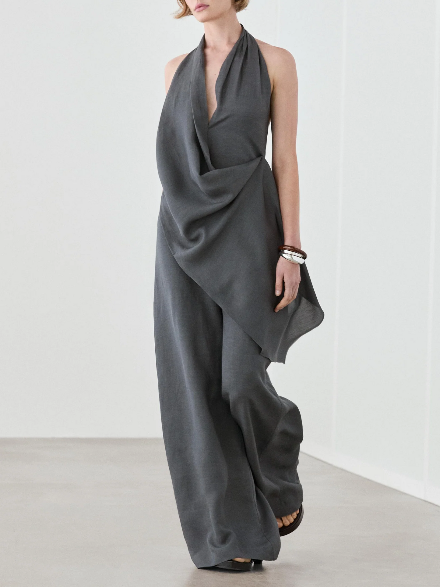 Asymmetric draped jumpsuit