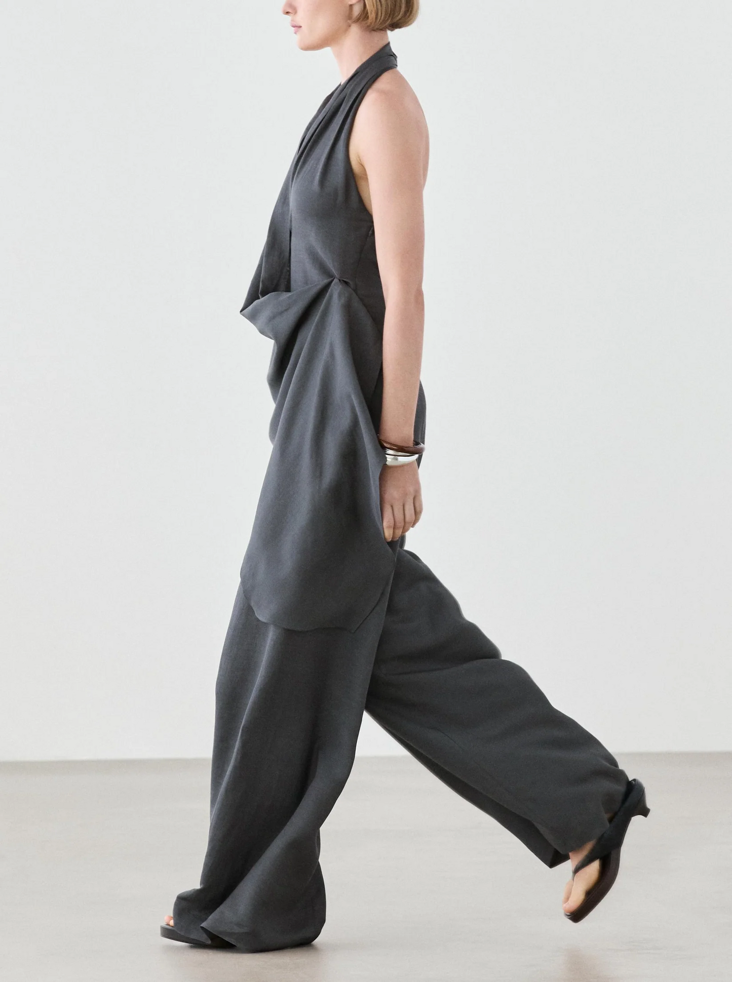 Asymmetric draped jumpsuit