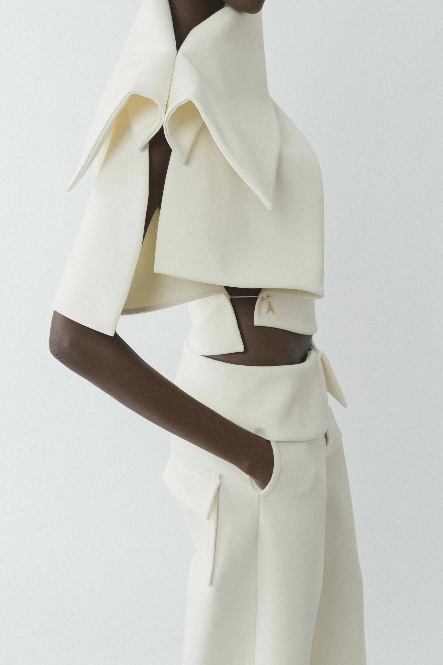 Asymmetric neckline deconstructed top