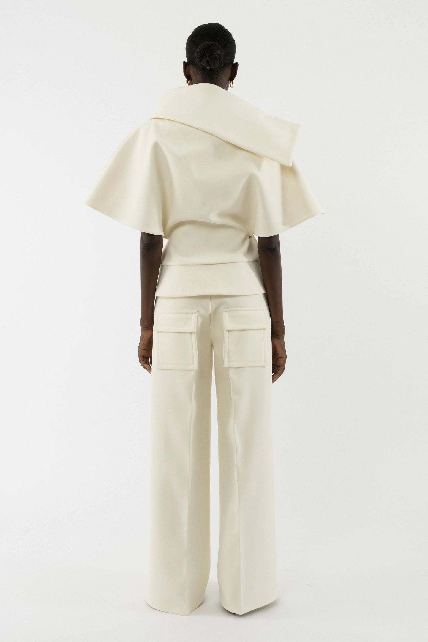 Asymmetric neckline deconstructed top