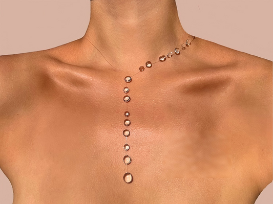Invisible necklace with a teardrop glass bead
