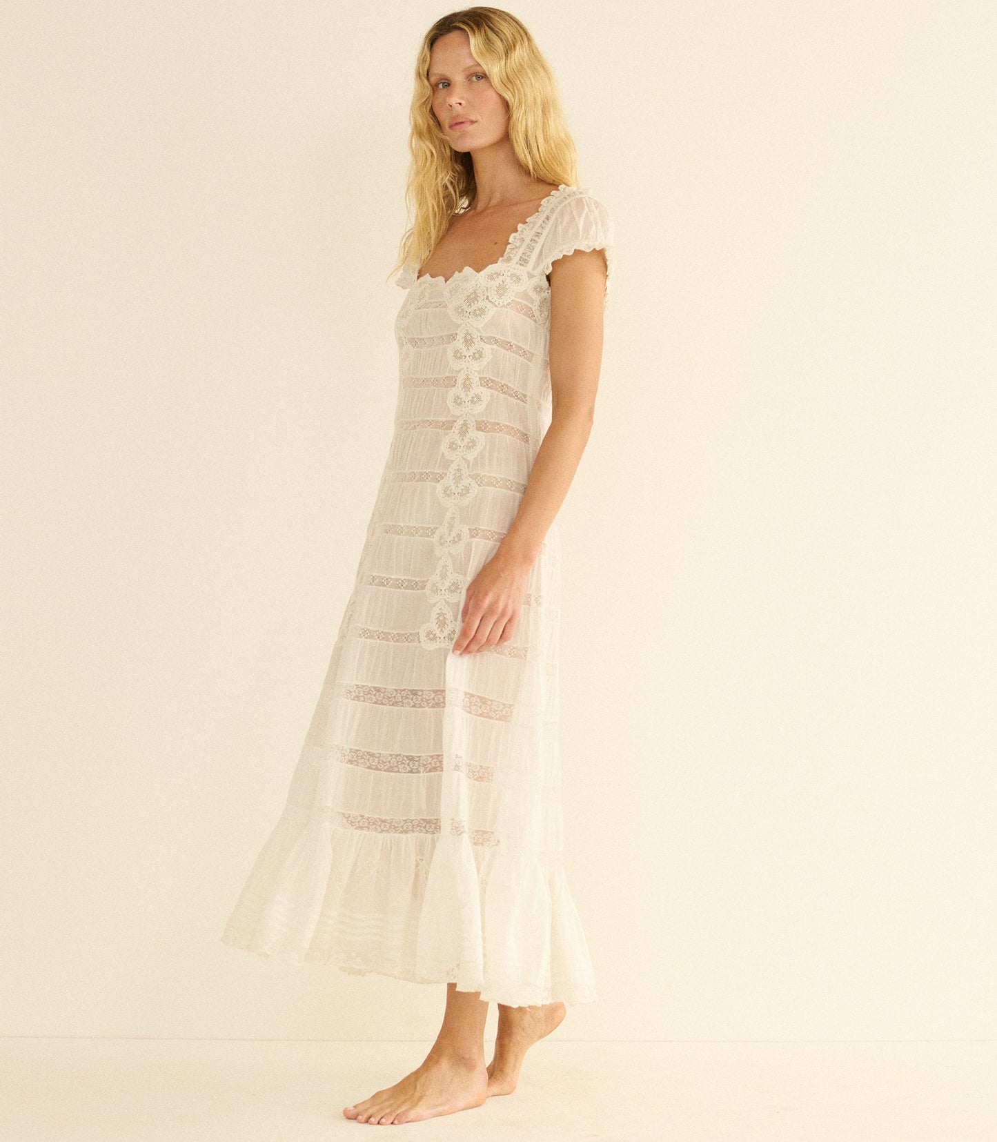 Vintage-style lace maxi dress with spaghetti straps