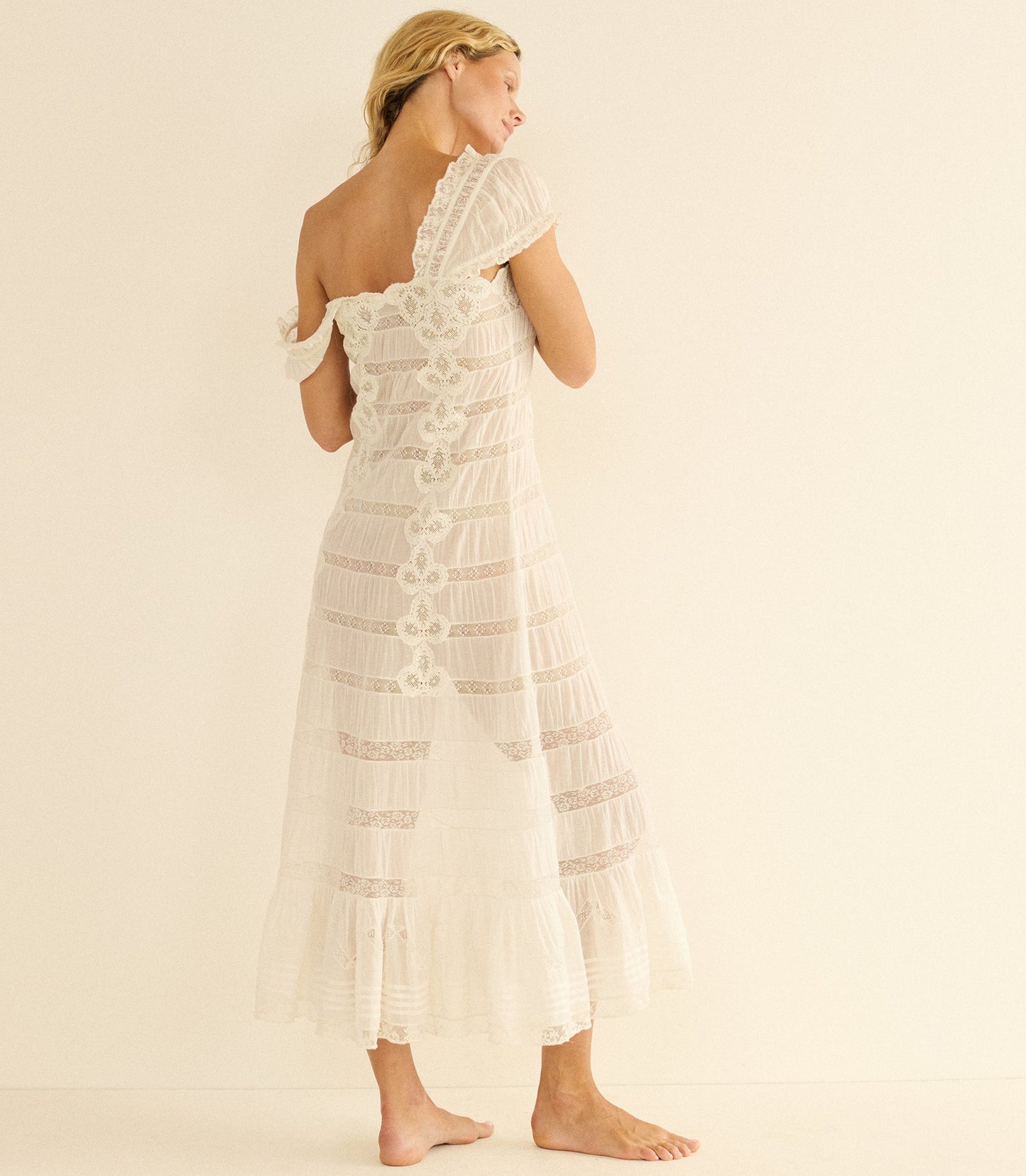 Vintage-style lace maxi dress with spaghetti straps