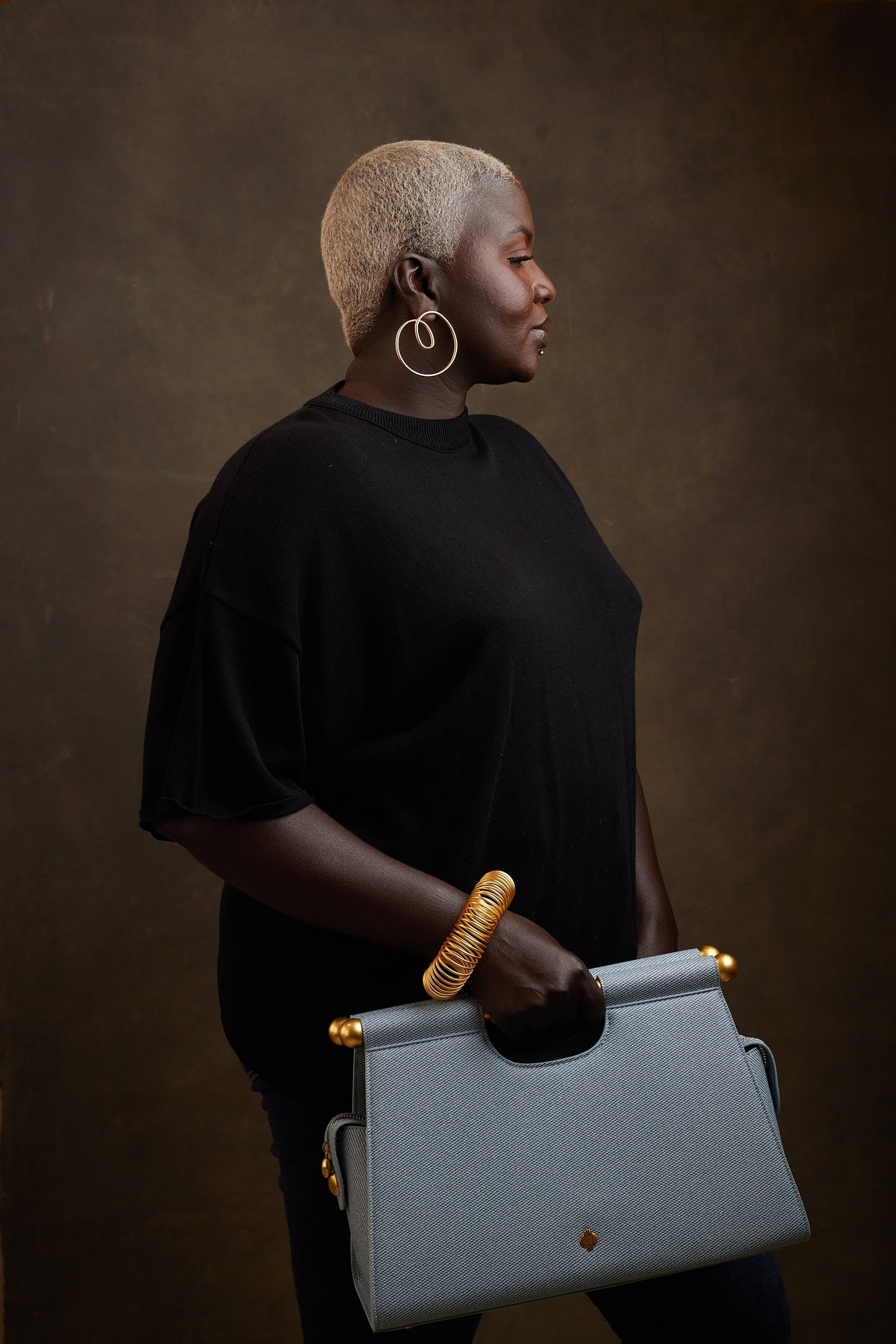 Structured light blue denim handbag