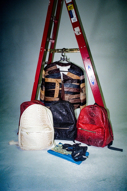 Crocodile-embossed leather backpack