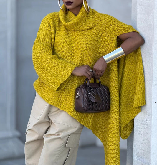 Yellow turtleneck knitted cape