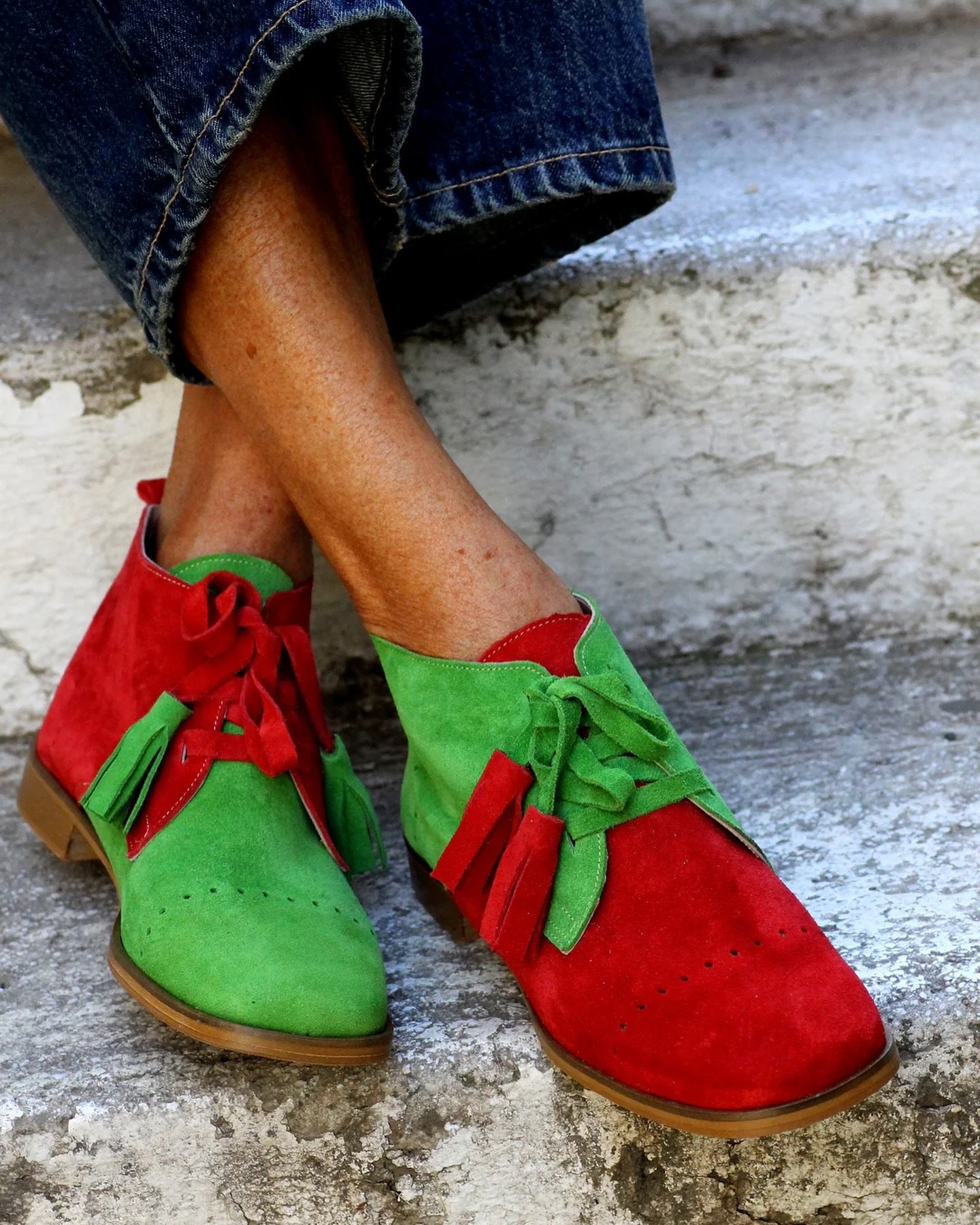 Suede fringed ankle boots