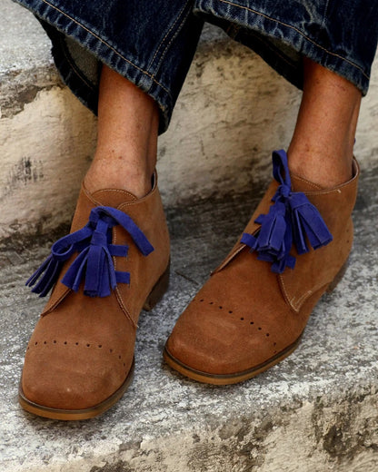 Suede fringed ankle boots